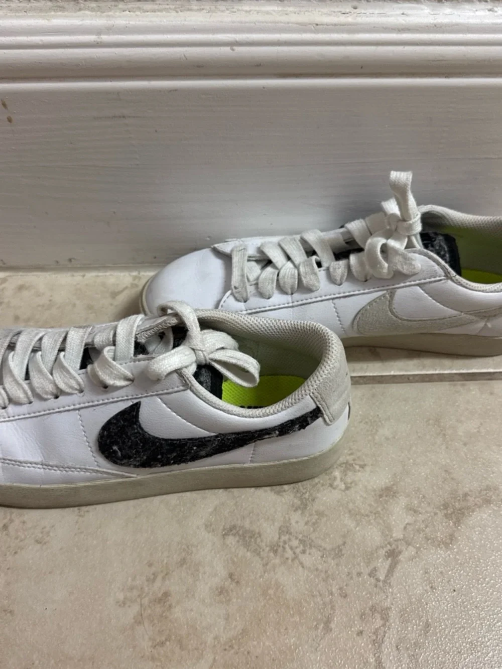Nike White Sneakers with Black Swoosh and Neon Yellow Insole